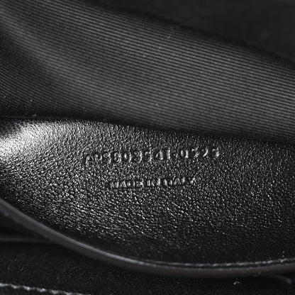 Black leather interior with embossed product code text