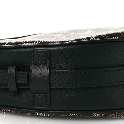 Black leather belt strap with buckle clasp on handbag