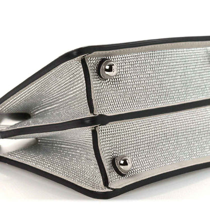 Silver crystal leather end panel with black edging and two snap buttons