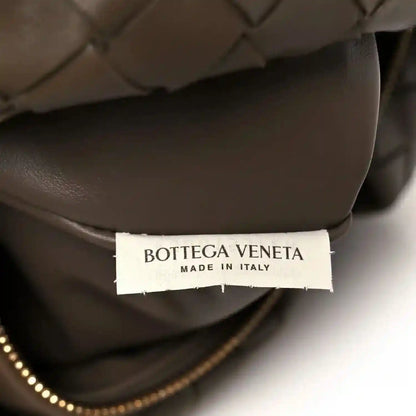 Taupe leather bag interior with Bottega Veneta label and “Made in Italy”