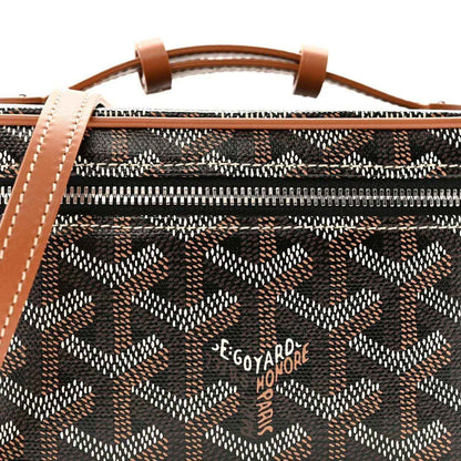 Mini vanity case front view with top handles; dark monogram canvas and zip
