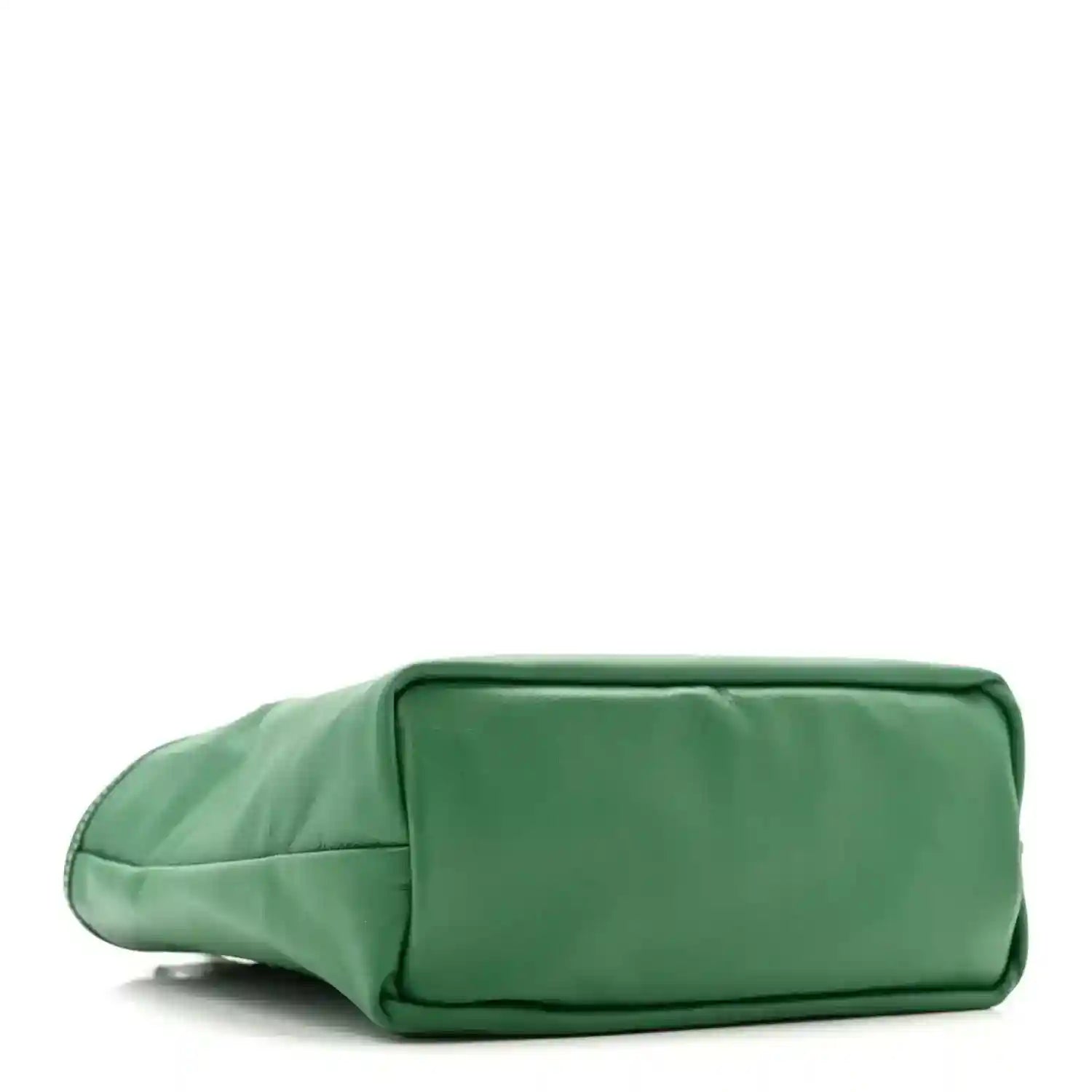 Green reversible mini tote bag with zip-top and rounded shoulder strap
