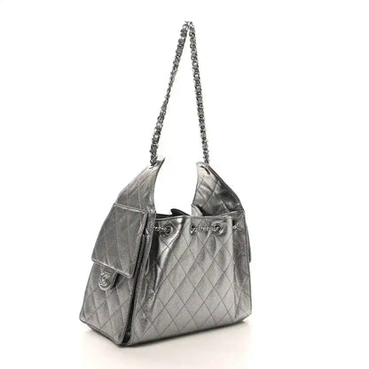 Chanel metallic quilted small handbag with chain strap and front flap pocket