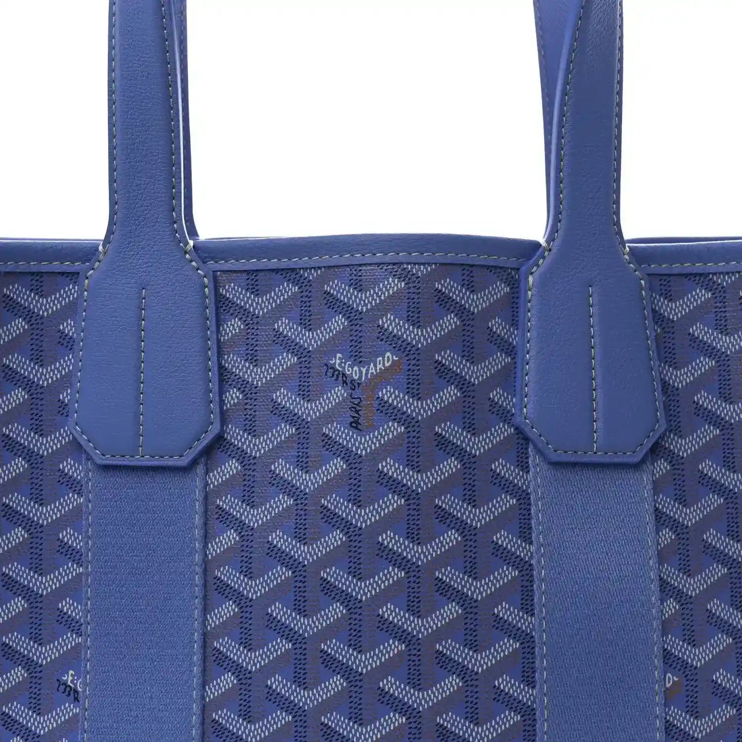 Close-up of Goyardine Villette PM tote bag front, blue coated canvas and center logo