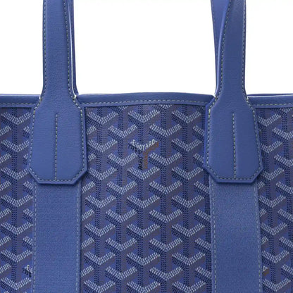Close-up of Goyardine Villette PM tote bag front, blue coated canvas and center logo