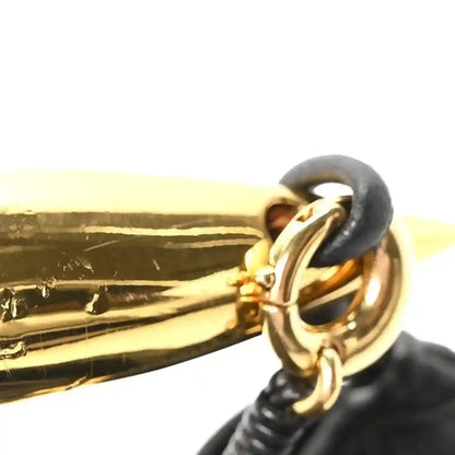 Black nappa leather bag with gold chain handle and clasp detail