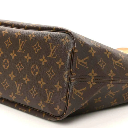 Louis Vuitton monogram tote bag corner detail, dark brown canvas with tan edge trim