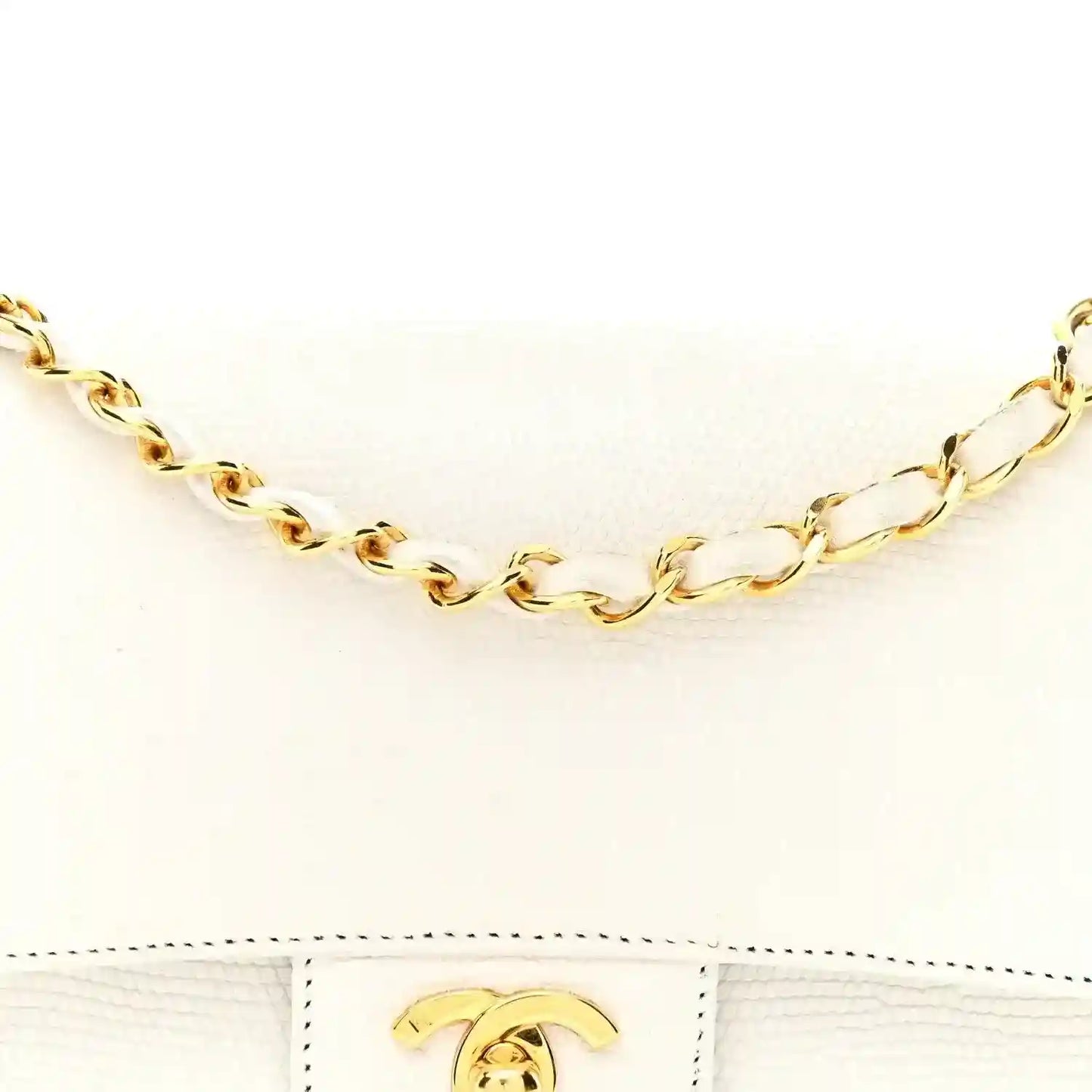 White lizard leather bag with gold chain strap and turn-lock flap clasp