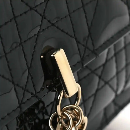 Black patent cannage Lady Dior pouch strap rings and metal hardware detail