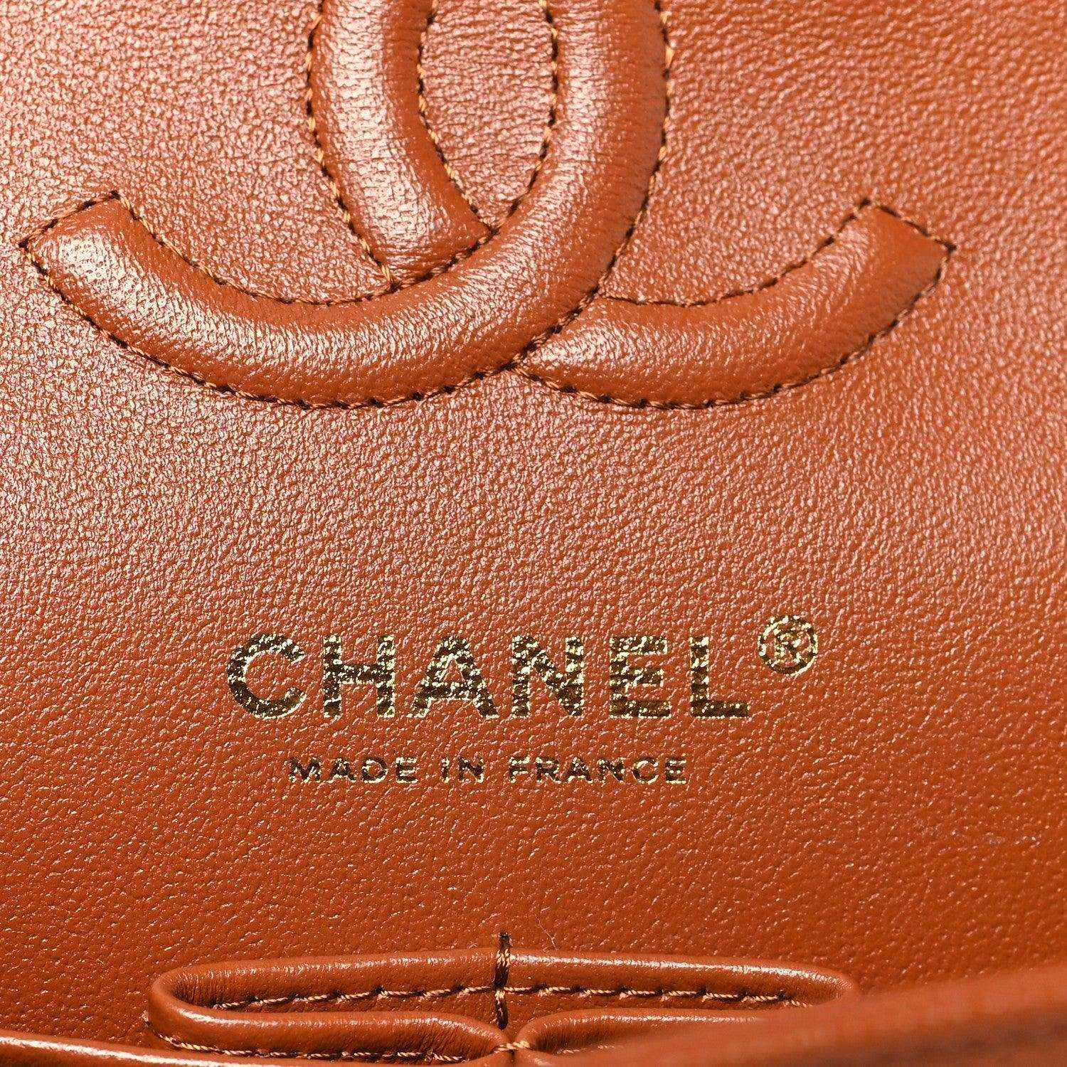 Chanel embossed interior stamp on caramel leather, reading CHANEL and MADE IN FRANCE
