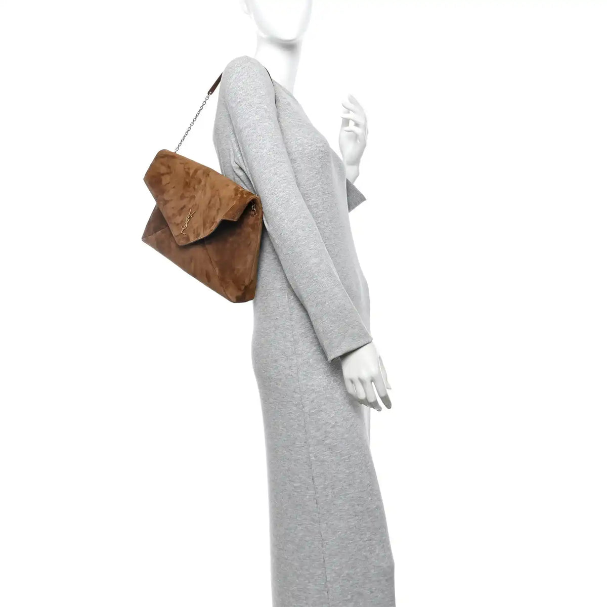 Caramel suede pouch on-chain bag worn over the shoulder with gold chain