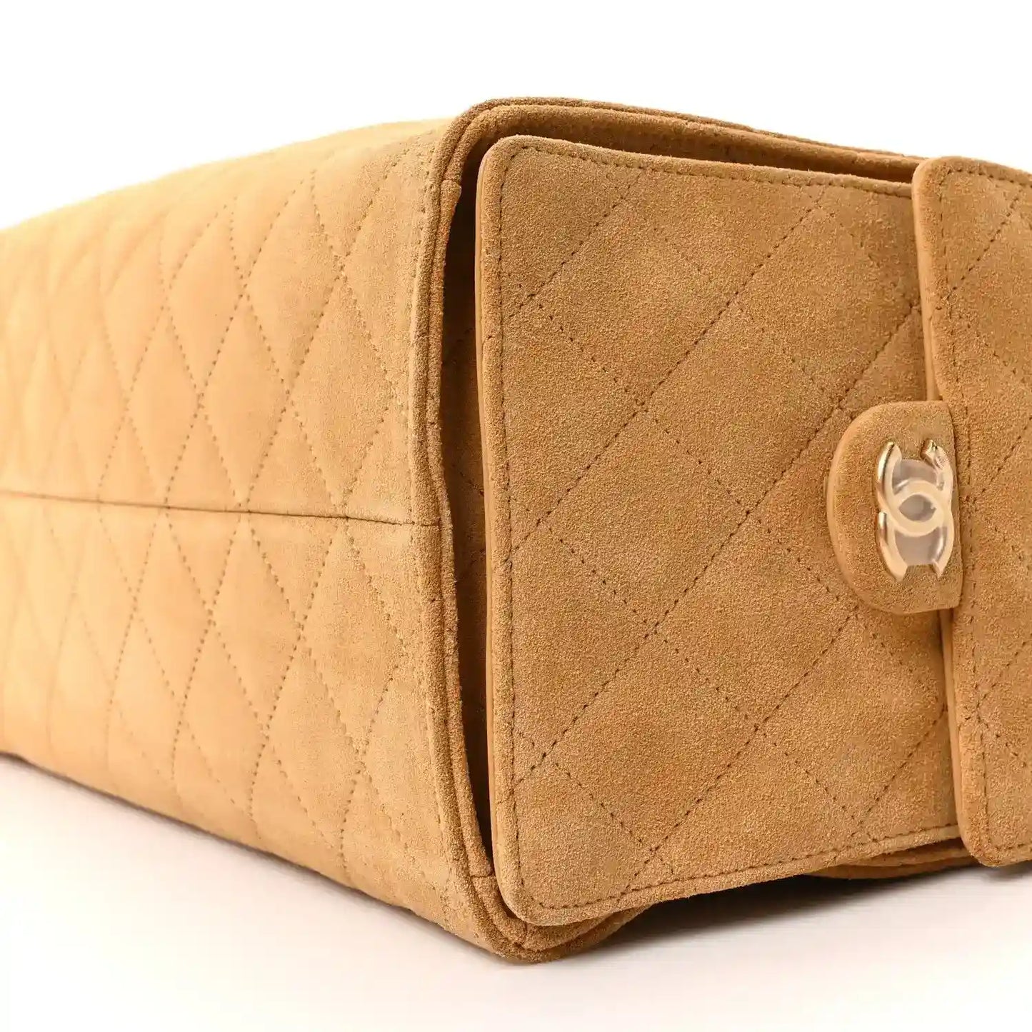 Chanel suede quilted medium handbag side with logo snap clasp in classic beige