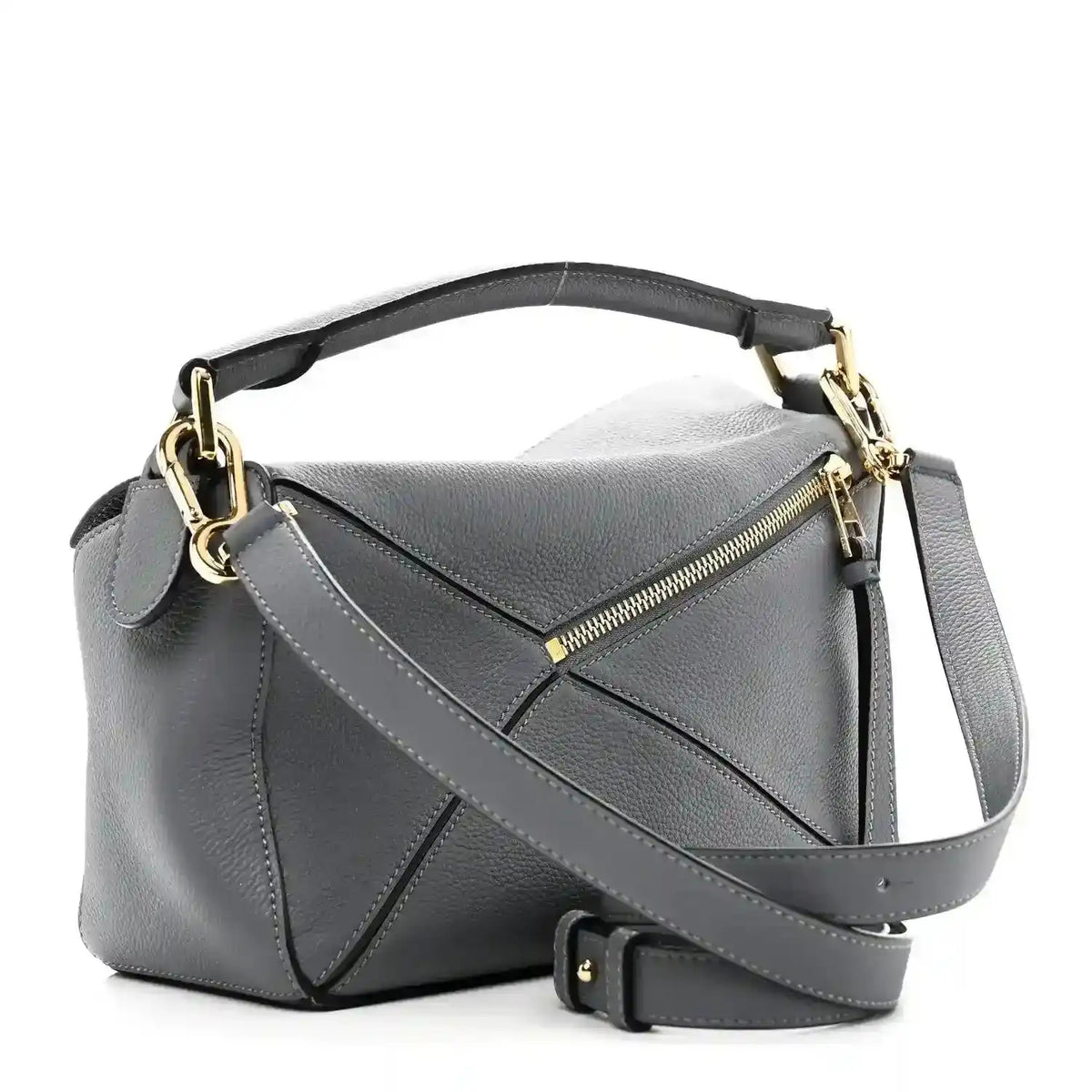 Small puzzle bag in dark gray leather with gold-tone hardware and zip pocket front