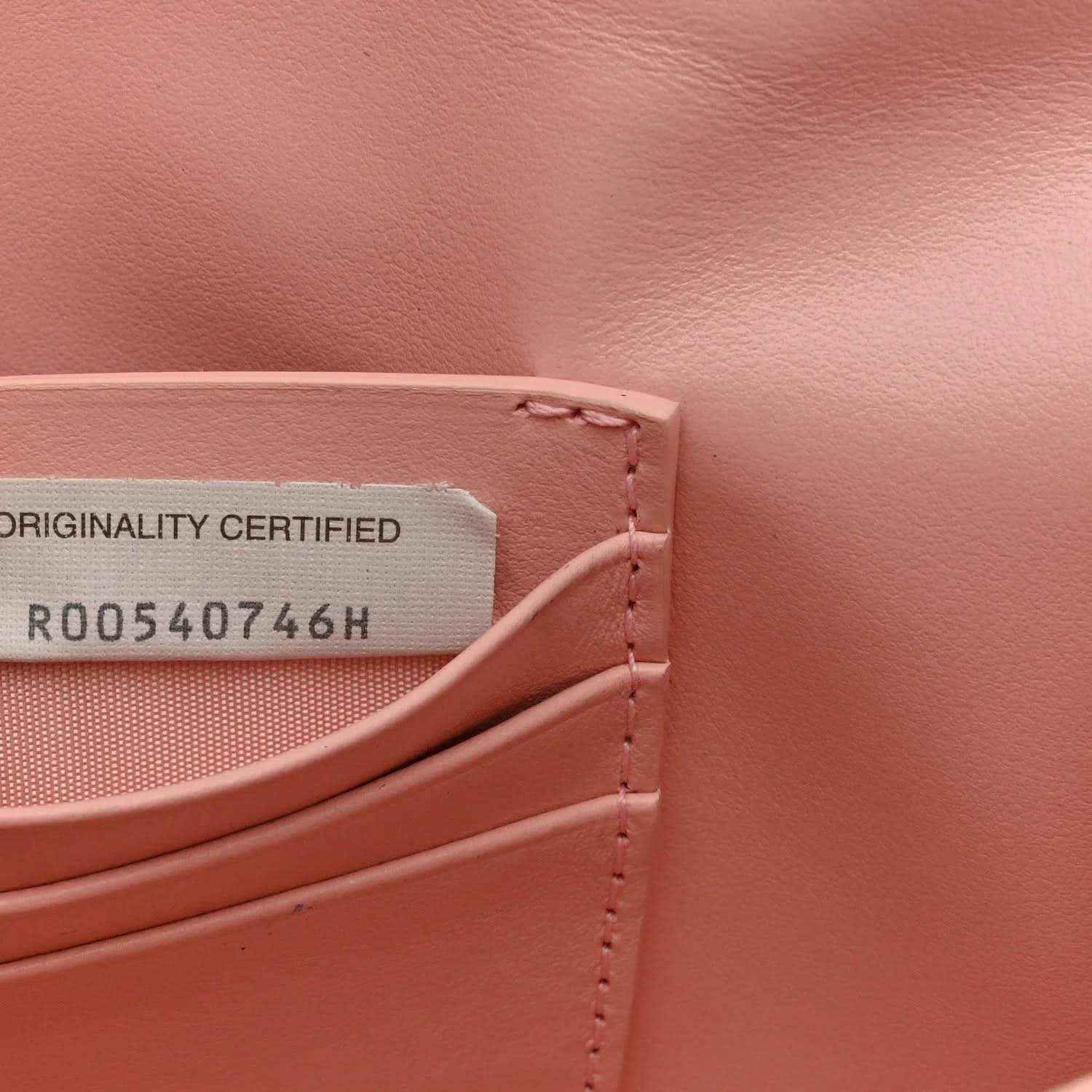 Bottega Veneta rose Nappa clutch with originality tag and stitched trim