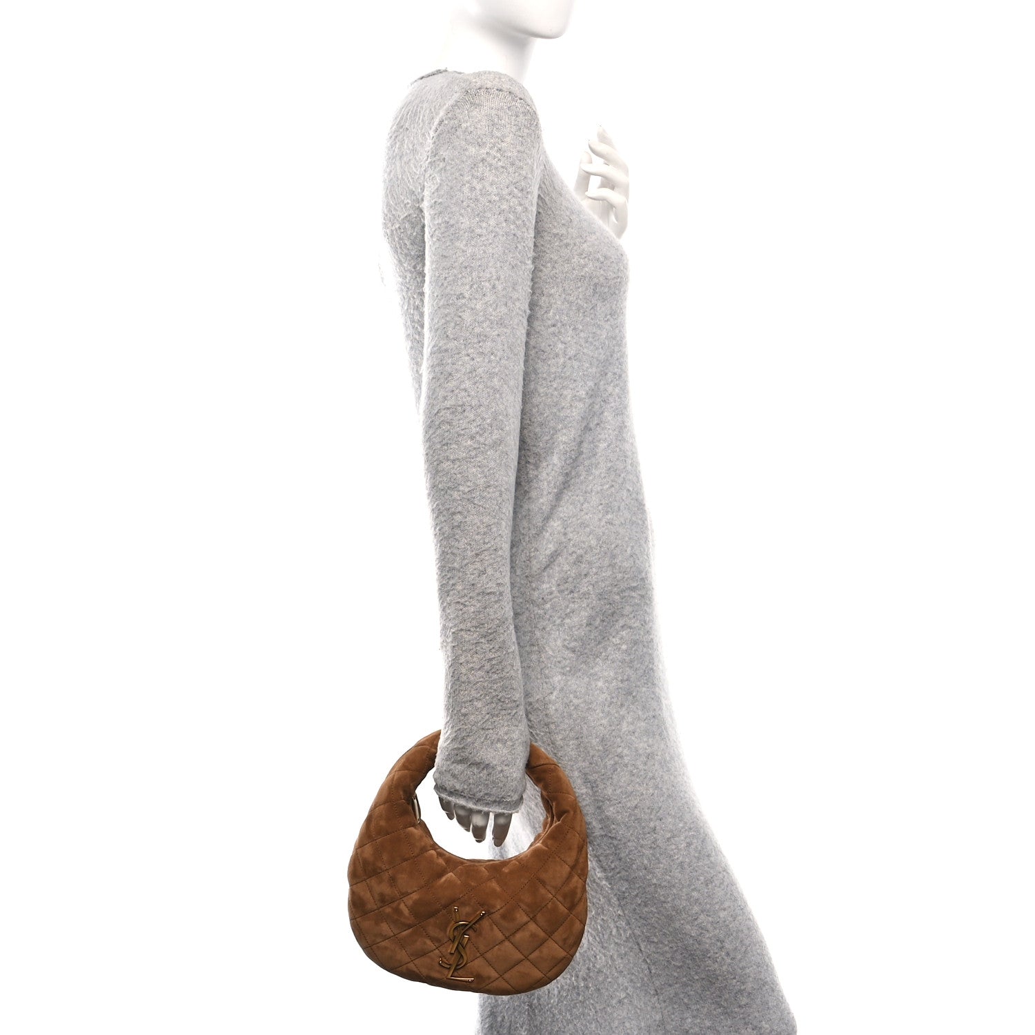 Cognac suede quilted tote bag shown from side with top handle and small logo