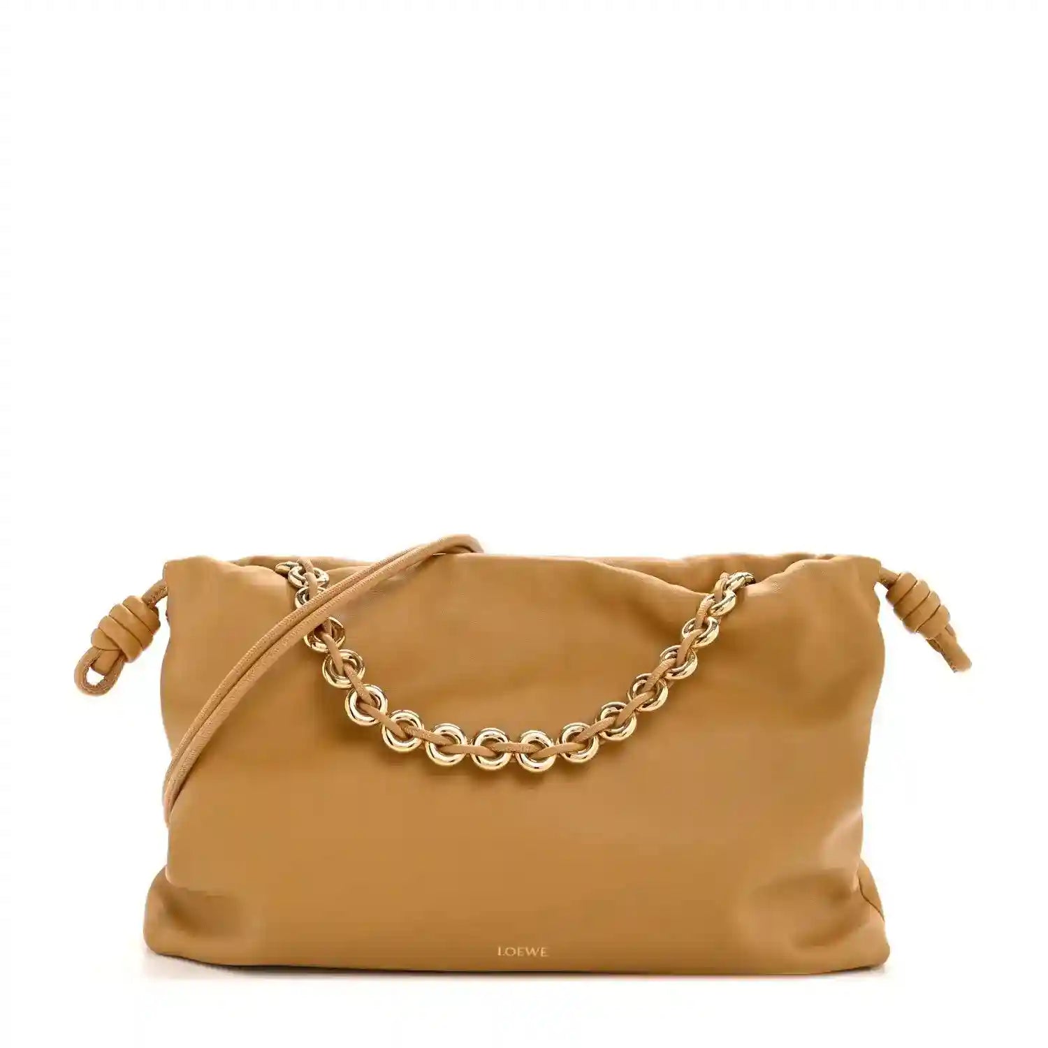 Tan leather drawstring clutch with braided chain shoulder strap