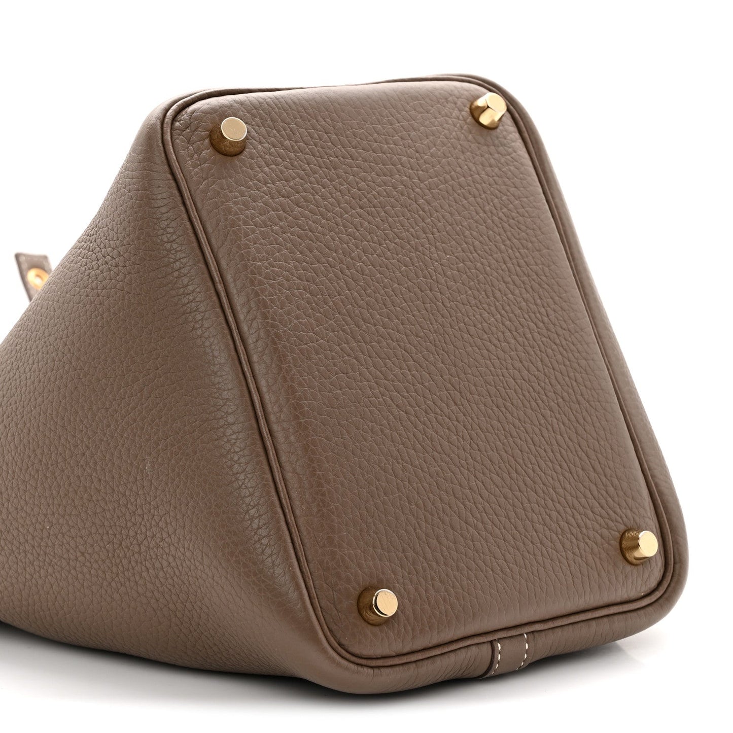 Taupe leather bucket bag with rounded top corners and gold snap buttons.