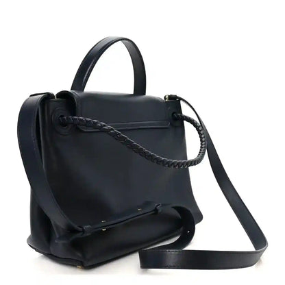 Black small handbag with braided strap detail and top handle