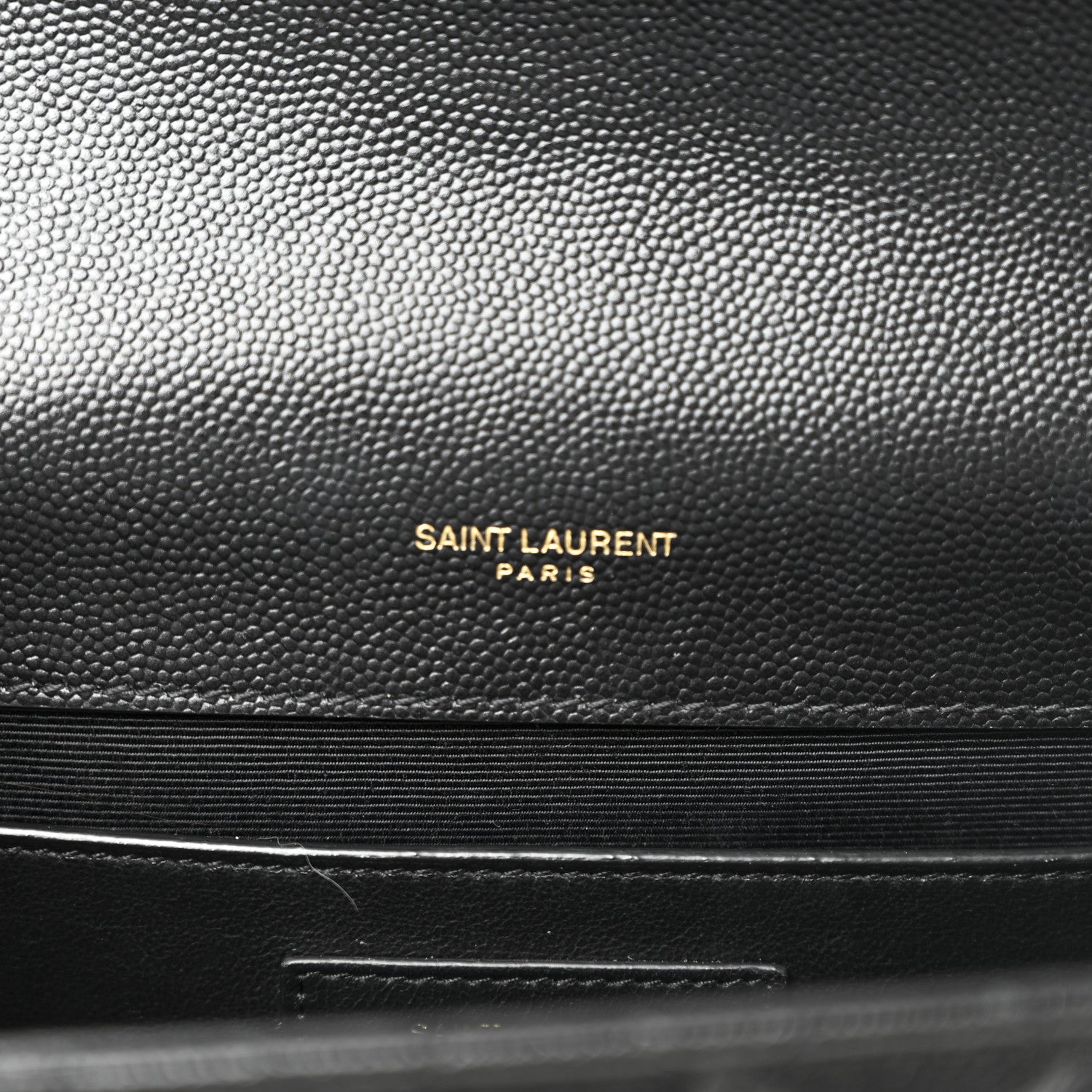 Black pebbled leather with embossed “SAINT LAURENT PARIS” branding