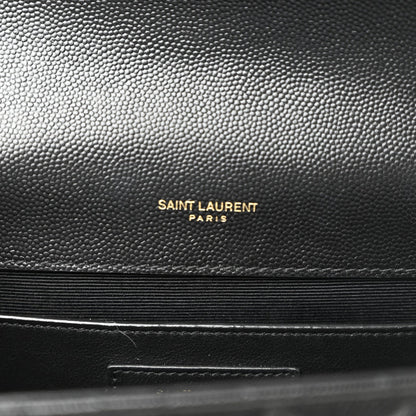 Black pebbled leather with embossed “SAINT LAURENT PARIS” branding
