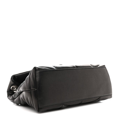 Saint Laurent quilted puffer satchel with black leather flap and top handle loop