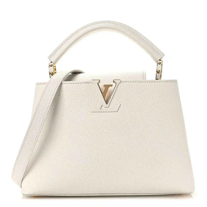 Louis Vuitton Capucines BB leather handbag with gold-tone LV logo and top handle
