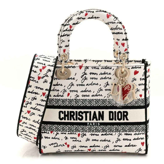 Medium Lady D-Lite bag in cream Dioramour canvas with top handles, zip, and Dior label