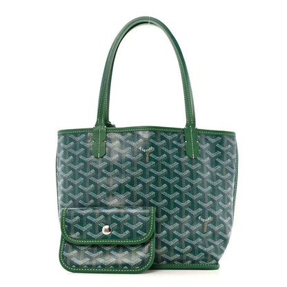 Green patterned mini tote bag with front flap pocket and snap closure