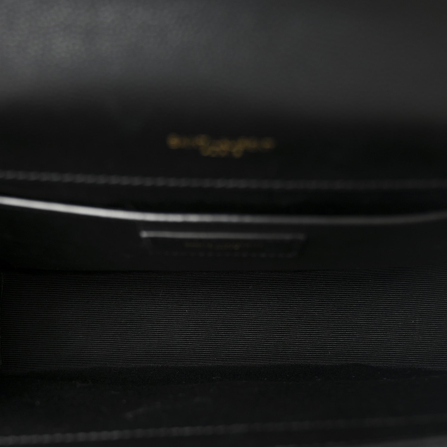 Black leather interior with small embossed brand label