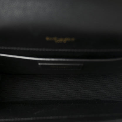 Black leather interior with small embossed brand label