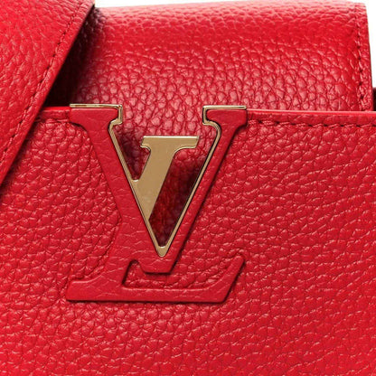 Louis Vuitton scarlet leather mini handbag with large gold-tone LV monogram on front