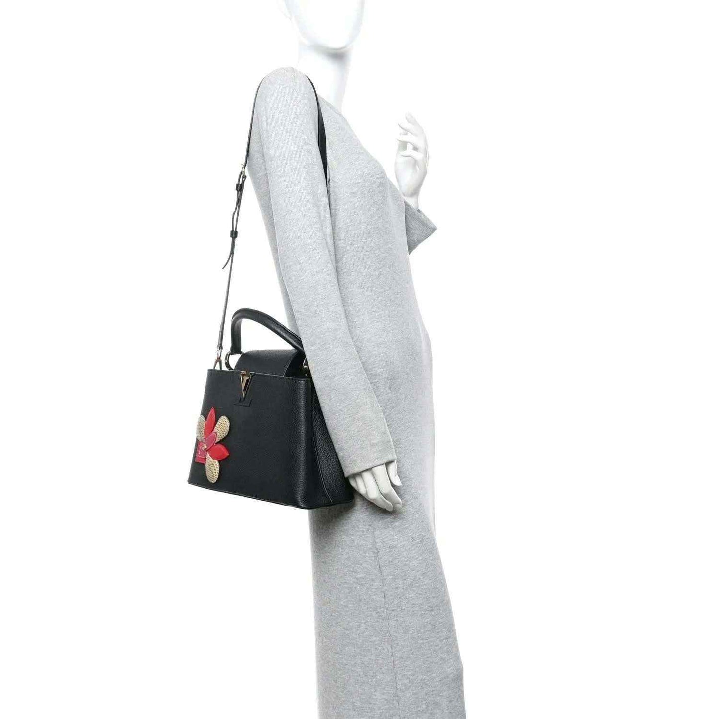 Louis Vuitton Capucines BB bag in black leather with flower applique and shoulder strap