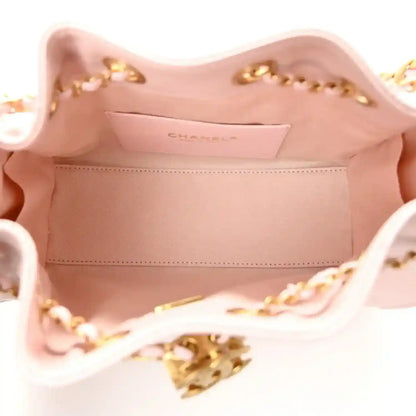 Chanel light pink leather mini 25 handbag interior with logo plaque