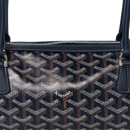 Close-up of patterned navy coated canvas Goyardine Bonbonniere bag front panel