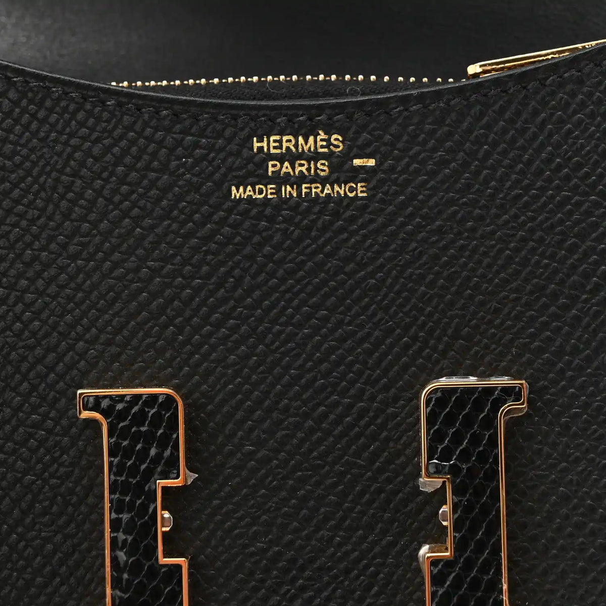 Hermes Paris Made in France stamp with gold H clasp on black leather