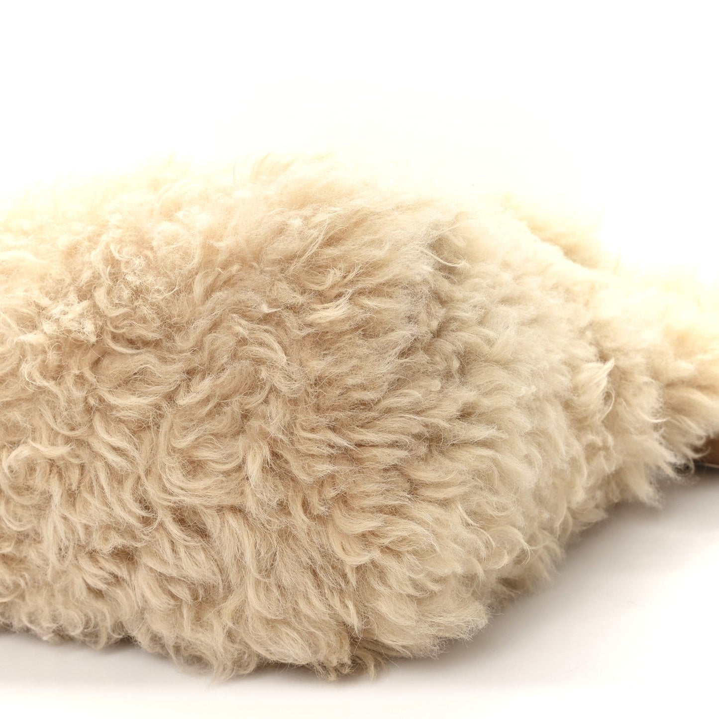 SAINT LAURENT shearling shoulder bag, natural side close-up of shaggy fur