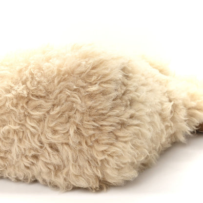 SAINT LAURENT shearling shoulder bag, natural side close-up of shaggy fur