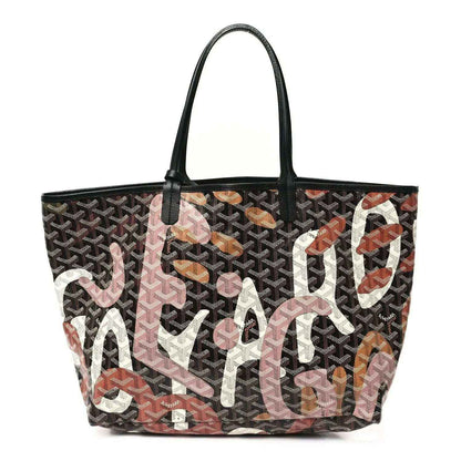 PM tote bag with black top handles and dark monogram canvas, featuring pink and orange lettering
