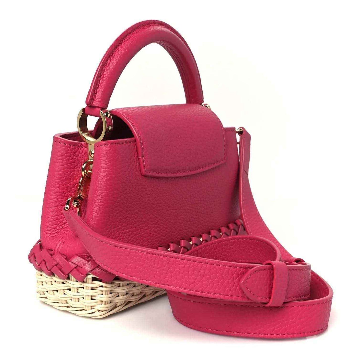 Magenta mini handbag with flap, gold hardware, and woven rattan base with strap