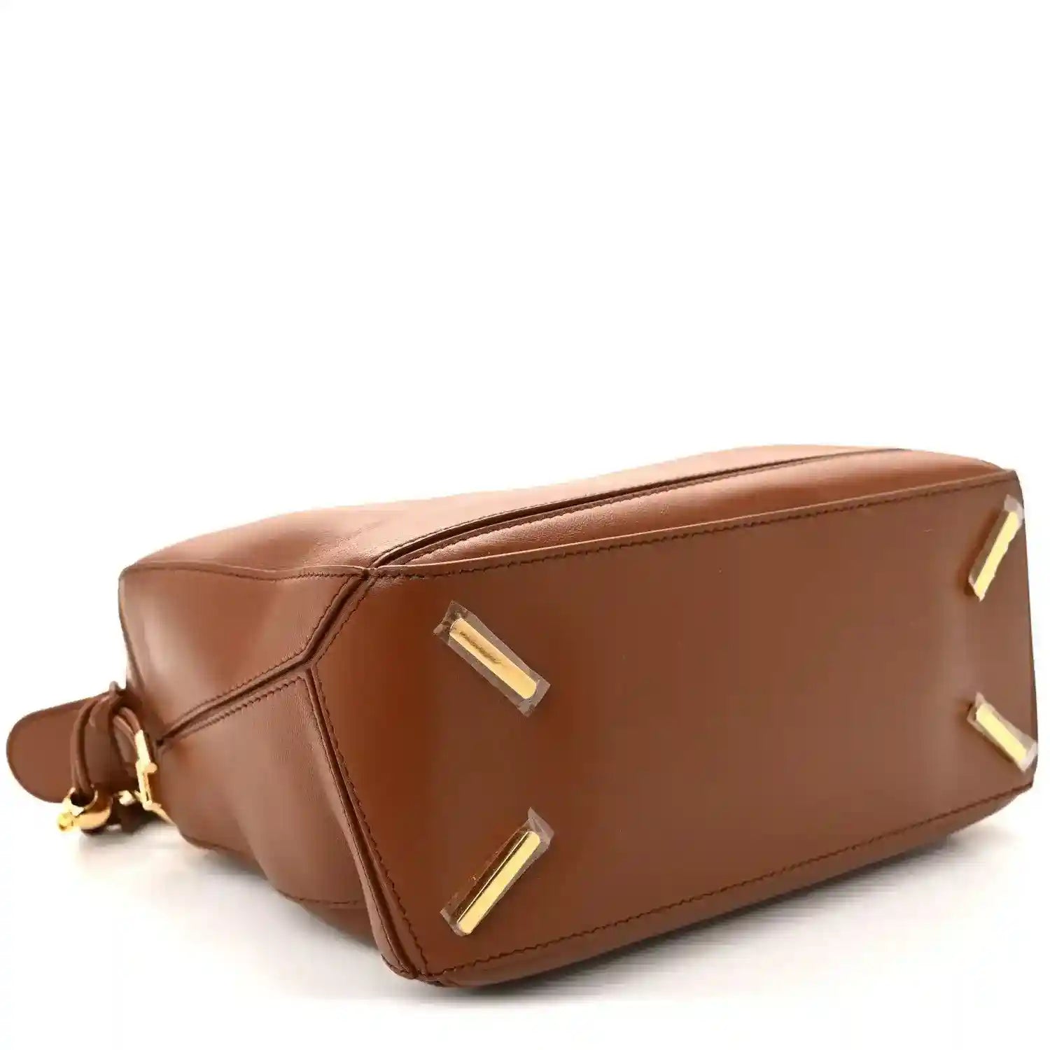 Small pecan brown leather bag with gold-tone corner plates and structured seams