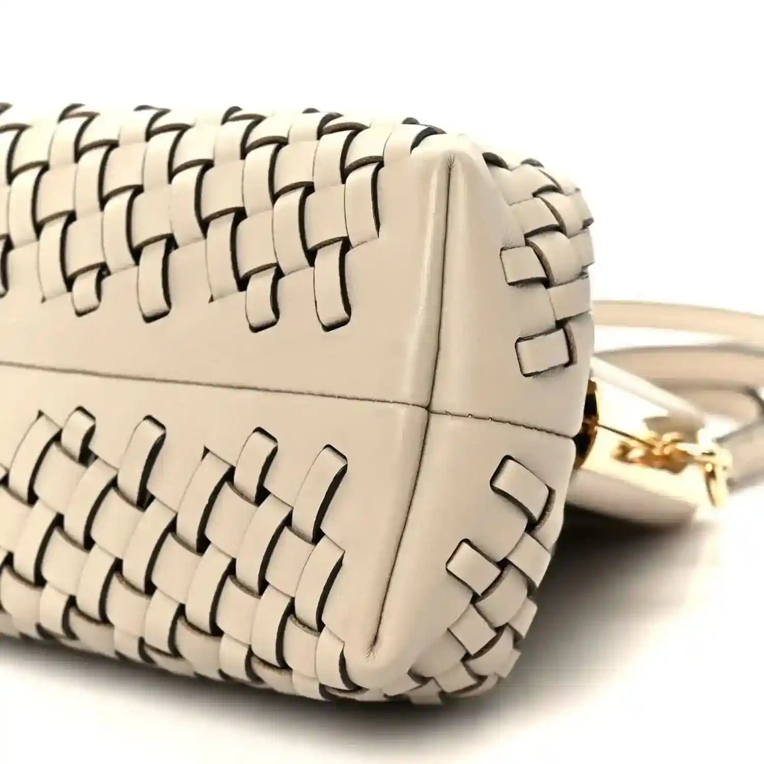 Ivory woven leather clutch with gold-tone hardware and shoulder strap attachment
