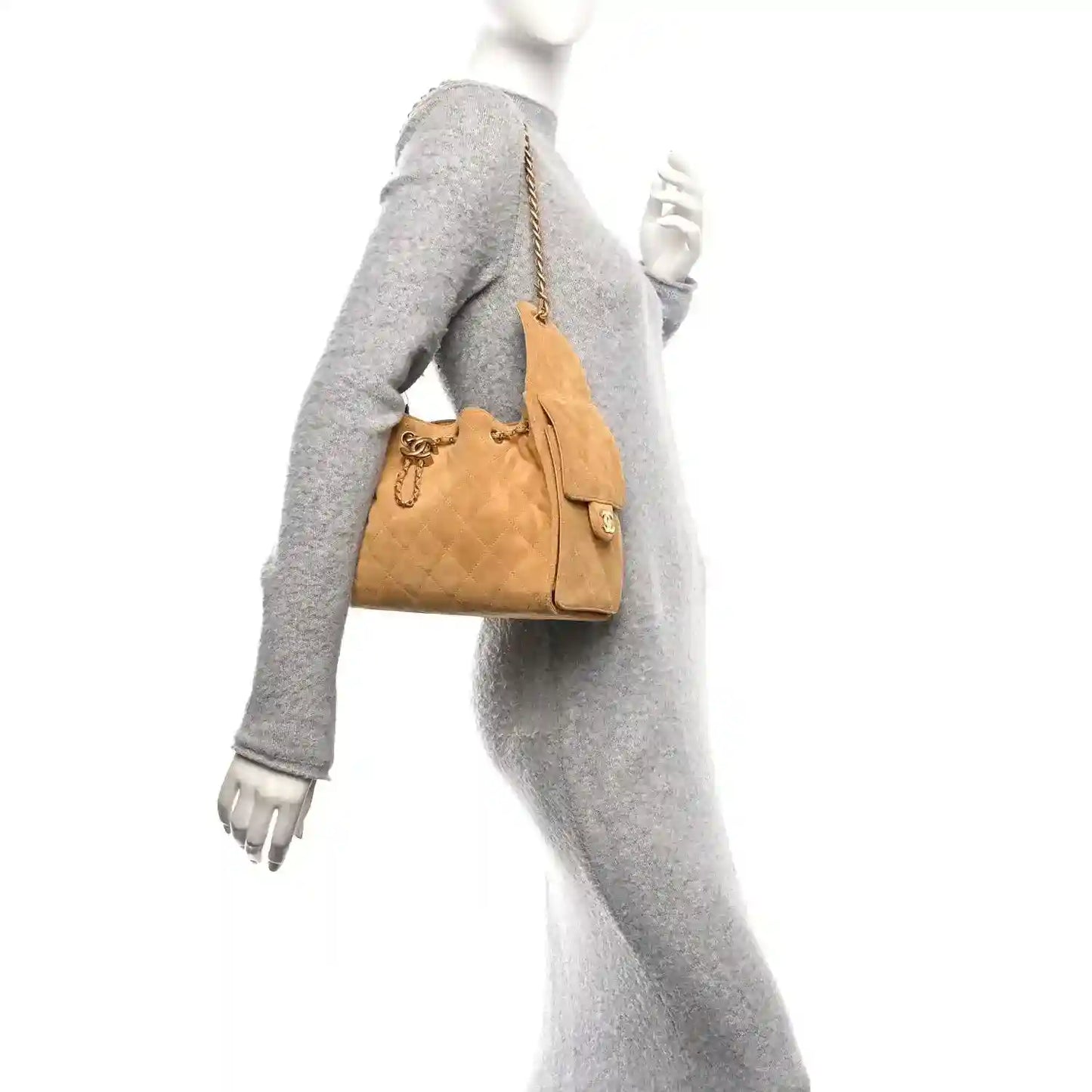 Chanel small quilted beige suede handbag with chain strap and gold-tone hardware