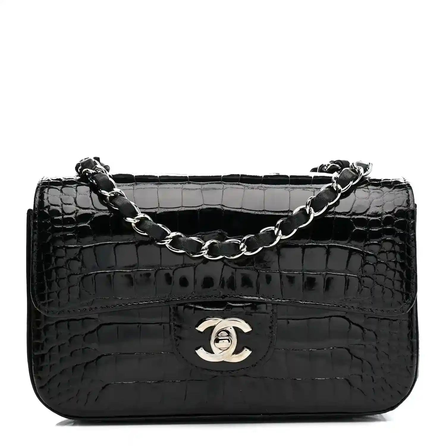Black shiny alligator mini rectangular flap bag with chain strap and Chanel logo.