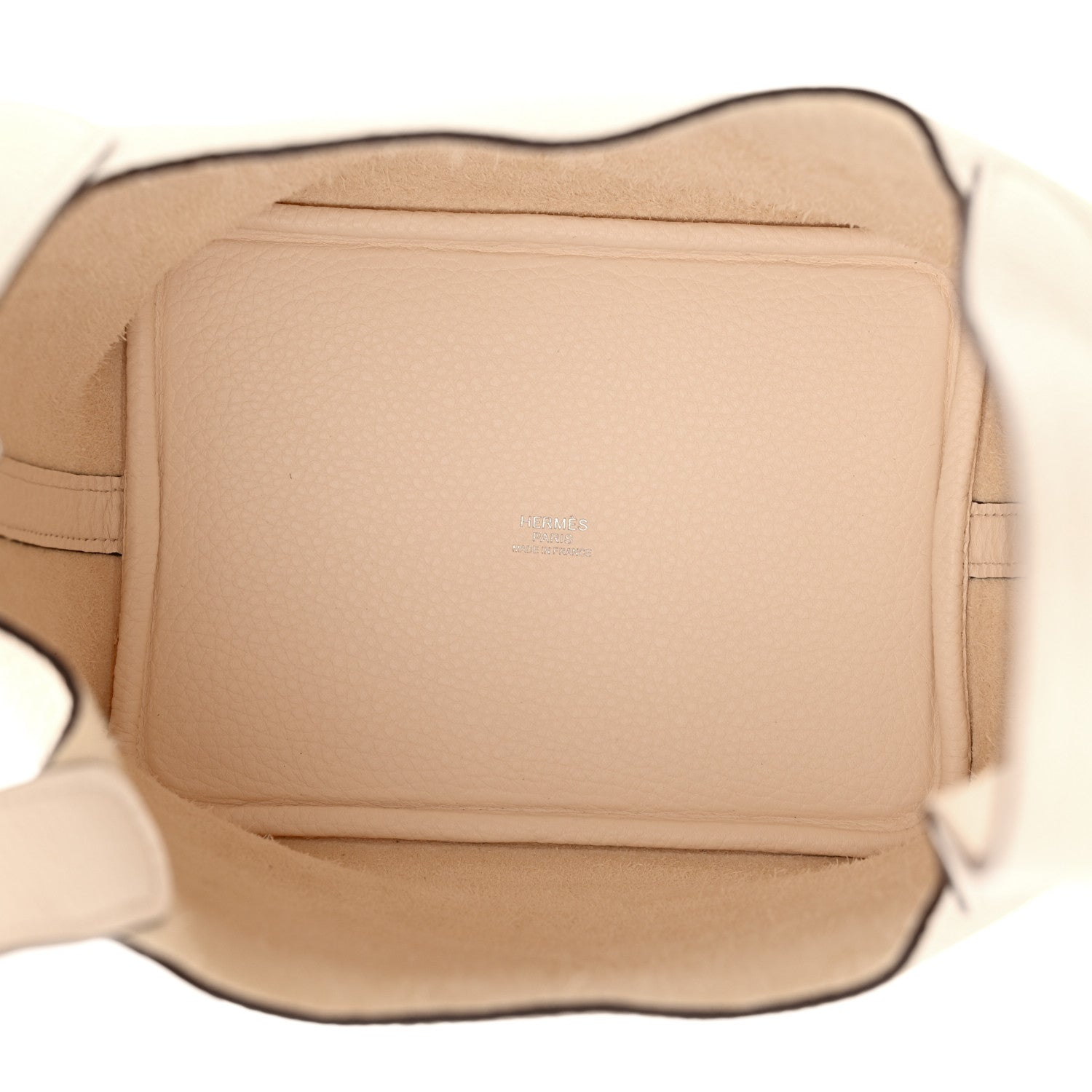 Nata leather handbag interior with smooth lining and zip pocket, shown open