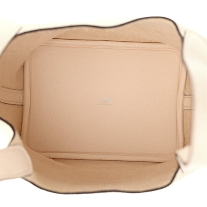 Nata leather handbag interior with smooth lining and zip pocket, shown open