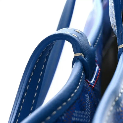 Sky blue tote bag handle with contrast stitching and reinforced strap loops