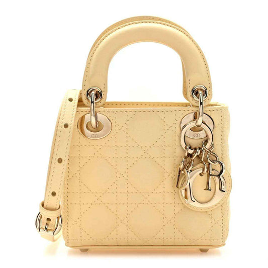 Micro Lady Dior handbag in soft yellow lambskin with cannage quilting and top handles