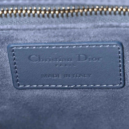 Christian Dior label patch on denim blue quilted Lady Dior bag