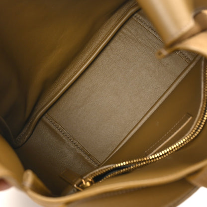 Small hobo bag interior detail with zipper track and smooth suede-like lining