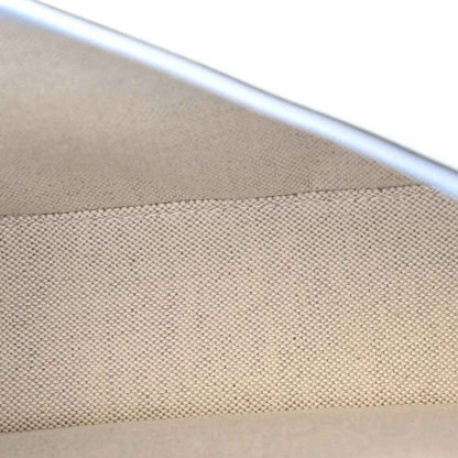 Beige interior textile with light blue piping along the bag edge